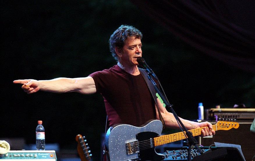 American musician Lou Reed performs on the stage in Budapest, Hungary, Tuesday, July 15, 2003. (AP Photo/MTI, Lajos Soos)